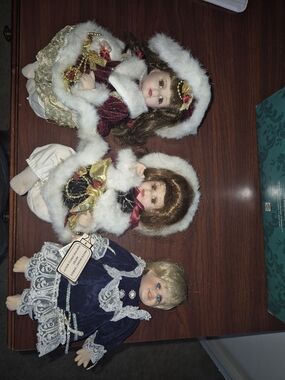 Set of Three Porcelain Dolls - Burgundy, Ivory & Navy Outfits